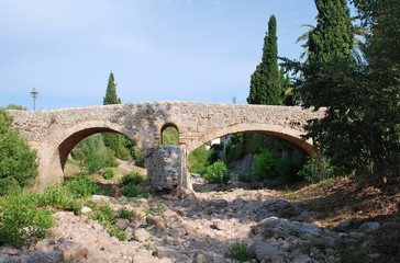 The Roman bridge across the Torrente de Sant Jordi at Pollenca on the Spanish island of Majorca. © newsfocus1