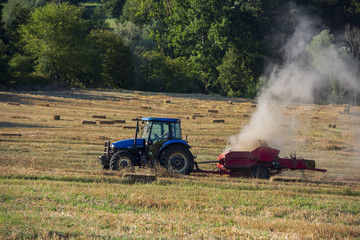 Hay baler making tractor, straw making work