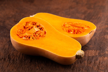 butternut squash over old wood background