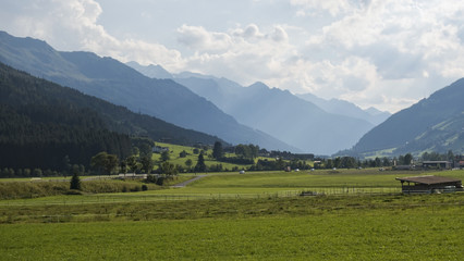 Fototapeta na wymiar Valley surrounded with beautiful mountains in Austria