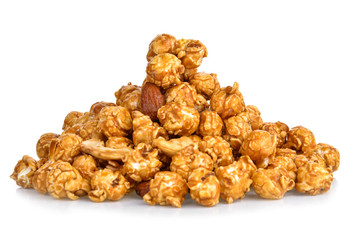 pieces of caramel popcorn on a white background