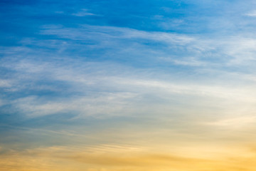 colorful dramatic sky with cloud at sunset.
