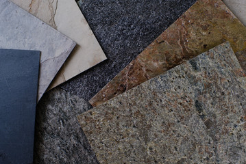 Synthetic stone is cut into thin sheets as a material for interior decoration.