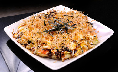 Okonomiyaki or Japanese pizza.