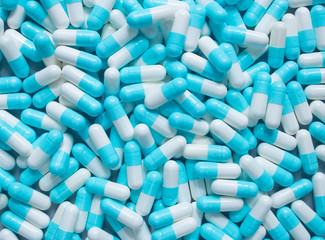 medicine drug capsule white and blue