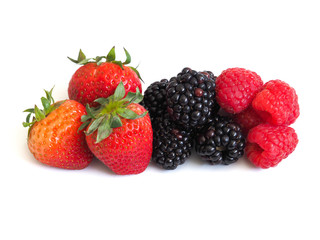 Obraz na płótnie Canvas Fresh strawberry, raspberry and blackberry on wooden background, healthy food and diet.