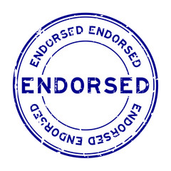 Grunge blue endorsed round rubber seal stamp on white background