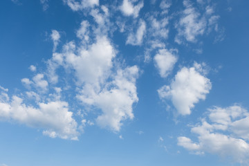 Naklejka na ściany i meble White clouds in summer blue sky