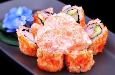 American Roll with tobiko sauce.