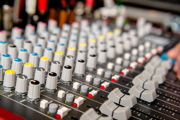     Blue DJ audio mixer shot close-up 