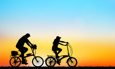 Fototapeta na wymiar silhouette Sport man whit bike on sunrise
