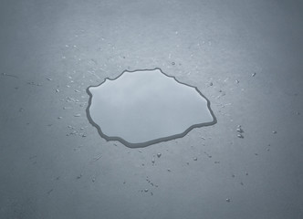 Liquid or water drops splash on the floor , Dark color tone, abstract background