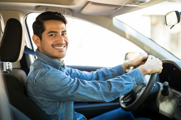 Attractive man driving a car