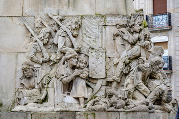 Alava, Spain. April 23, 2018: Detail of the marble base of the statue of the Victory commemorating the battle of Vitoria against Napoleon in 1813, last fought against him in Spain