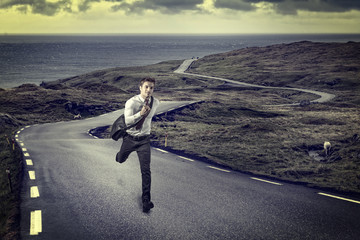 man run on lonely road