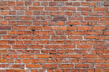 Old red brick wall of St.Peter's church in Riga, Latvia
