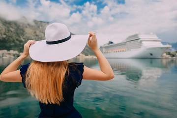 woman stands on cruise liner background