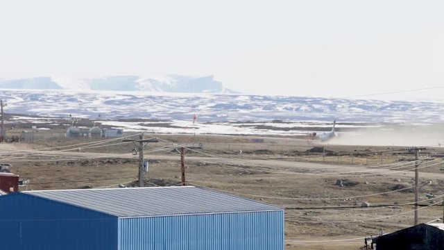 An Airplane taking off in the Distance, Pond Inlet Nunavut