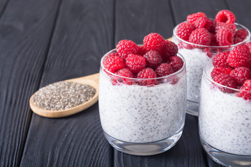 Chia pudding in glass with raspberry