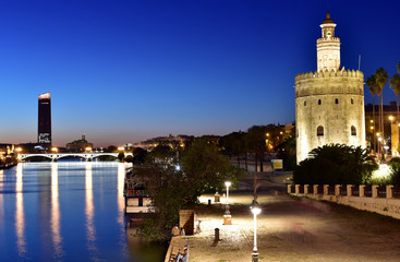 Torre del Oro (Gold Tower) and river Rio Guadalquivir at night, Seville, Andalusia, Spain, Europe