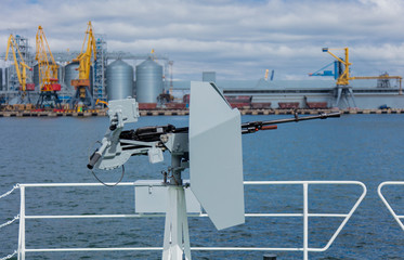 armed machine gun on ukrainian navy ship in time of conflict with Russia.