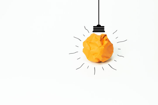 Paper make to light bulb for idea power energy concept on white background.