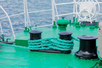 Green ship rope on a ship. Close-up view