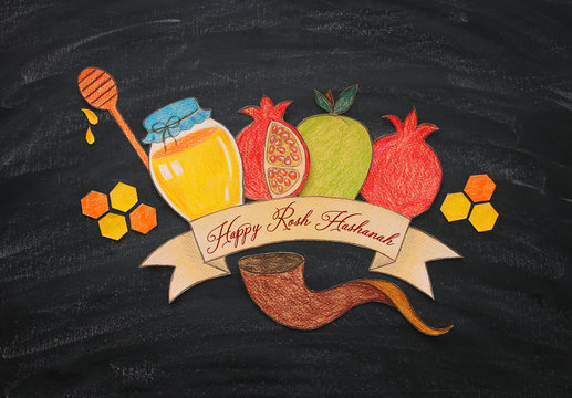 Rosh hashanah (jewish New Year holiday) concept. Traditional symbols shapes carved from paper and painted.