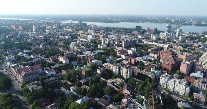 Panoramic view of the old town near the river, a Soviet-built city near the river from the air