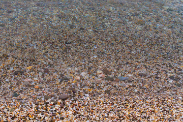 Sea stones on the seashore in the summer