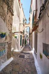 a narrow street in the summer resort city