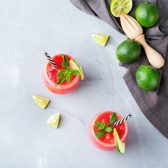 Fototapeta na wymiar Alcohol drink red watermelon cocktail for summer days