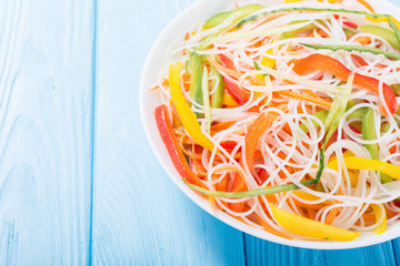 Salad from rice noodles with vegetables