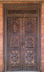 Fototapeta na wymiar Hindu temple wooden door in Bhaktapur Nepal