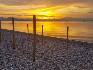 Loutraki sea in Greece against the sunset.