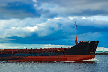 Fototapeta premium Black cargo ship