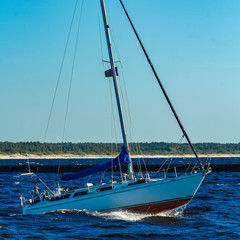 Sailboat on the waves