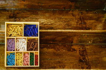 Color bead stairs, counting  in a montessori classroom