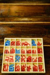 Letters to learn to write and read in your wooden box, montessori classroom.