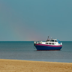 Small blue passenger ship