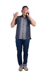 Fototapeta premium Young Man Talking on Phone, Explaining Something Gesture