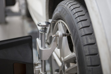 Fototapeta premium Equipment for checking the geometry of the wheels of the car