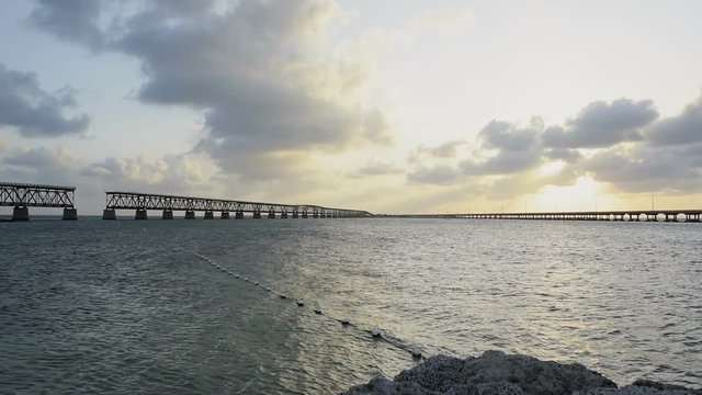 Sunset dark evening clouds in Bahia Honda State Park, Florida Keys, with old bridges, ocean and gulf of mexico, slow motion
