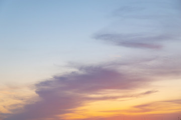 Naklejka na ściany i meble beautiful view of sunset. orange clouds on blue sky