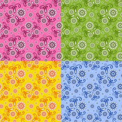 Abstract seamless pattern set. Flowers in blue, pink ,green and yellow colors. Template for textile, carpet, wallpaper, fabric, wrapping paper
