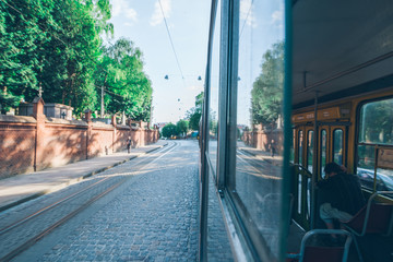 view from tram half inside half outside. old european city view
