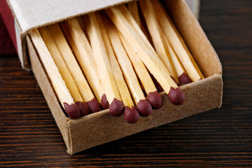 closeup of open box of wooden matches