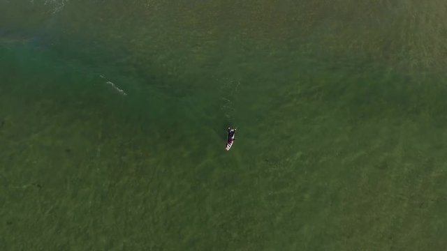 Aerial view of surfer at ballybunion beach, limerick, Ireland