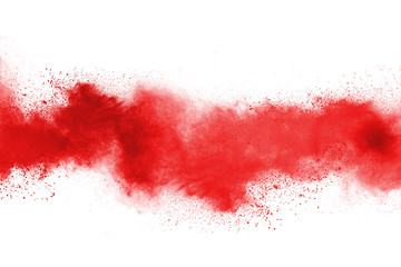 Freeze motion of color powder exploding on white background.