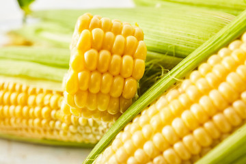 Fresh corn on wood desk